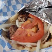 Pork Souvlaki (Kebab) · Our Moist Pork Taken off the Skewer Stick and Wrapped in a Pita Bread with Tomatoes, Onions ...