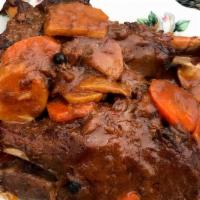 Lamb Shanks · Twin new zealand lamb shanks braised then baked until fork tender served with root vegetable...