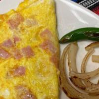 Omelette · Served with beans and tortillas.