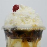 Ellie'S Turtle Temptation · Two scoops Madagascar Vanilla Bean ice cream layered with caramel, hot fudge and roasted pec...