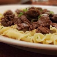 Beef Stroganoff · Beef tenderloin and mushrooms over pasta.