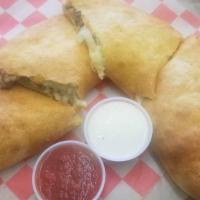 All Meat Calzone · Pepperoni, sausage, beef, Italian sausage, Canadian bacon, and cheese. Served with marinara ...