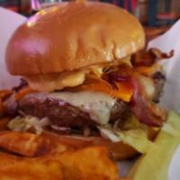 The Chipotle Burger · Wisconsin Monterey Jack & Cheddar, Sautéed Onion, Wisconsin Smoked Bacon, Chipotle Mayo, Let...