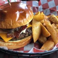 The Badger Burger · Wisconsin Monterey Jack & Cheddar, Sauteed Mushrooms, Wisconsin Smoked Bacon, Caramelized On...