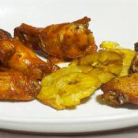 Naked Wings · Naked Wings are a staple. These are marinated with salt, garlic, oregano, paprika, and
black...