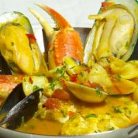 Asopao De Mariscos (Seafood Soup) · A hearty meal-in-a-bowl, featuring shrimp,fish, littleneck clams, mussels, green lip
mussels...