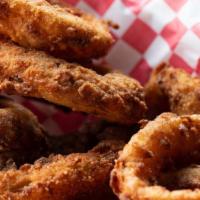 Okie Onion Rings · A large portion of hand breaded onions rings.