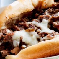 The Original Philly Cheesesteak Sandwich · All sandwiches served with French fries. Phillies are served with a premium steak & carameli...