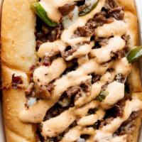 Chipotle Cheesesteak Sandwich · Our Most Popular Philly! Premium steak, caramelized onions & bell peppers on a toasted hoagi...