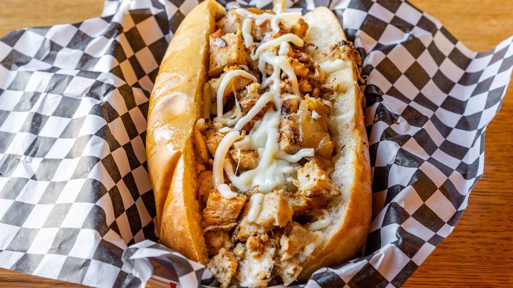 Chicken Philly Cheese Steak Sandwich · Your favorite traditional Philly with roasted chicken & caramelized onions. Choose cheddar whiz or provolone cheese. Served with French Fries or any upgraded side