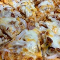 Chicken Bacon Ranch Pizza · Ranch dressing base, Garlic Chicken, Bacon Bites  and Onion