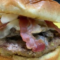 Swiss Mushroom Burger · Double Decker Burger, Mushroom, Bacon , Swiss american Cheese and Mayo on a Brioche bun