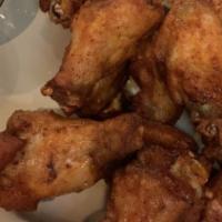 Wings · Eight of our jumbo wings oven roasted and then deep fried to perfection and spun in your cho...