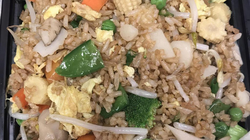 #27. Shrimp Fried Rice · Mixed with onions carrots peas egg and soy sauce.