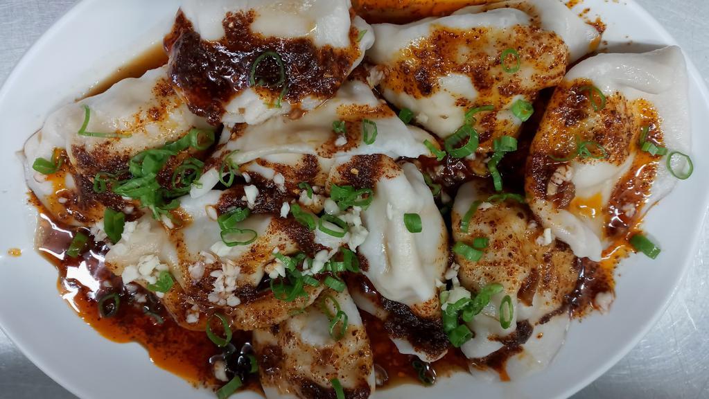 Chung Du Dumplings · Boiled Pork with cabbage dumplings with a spicy garlic sauce