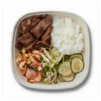 Kalbi · (GF) Short Ribs marinated in a savory soy base with garlic & ginger. Recommended with Kimchi...