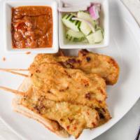 Sate Gai · Four (4) marinated and grilled chicken, served with peanut sauce and cucumber sauce.