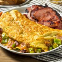 Mexican Omelette · Delicious Breakfast Omelette prepared using 3 eggs, cheese, onion, green pepper, tomato and ...