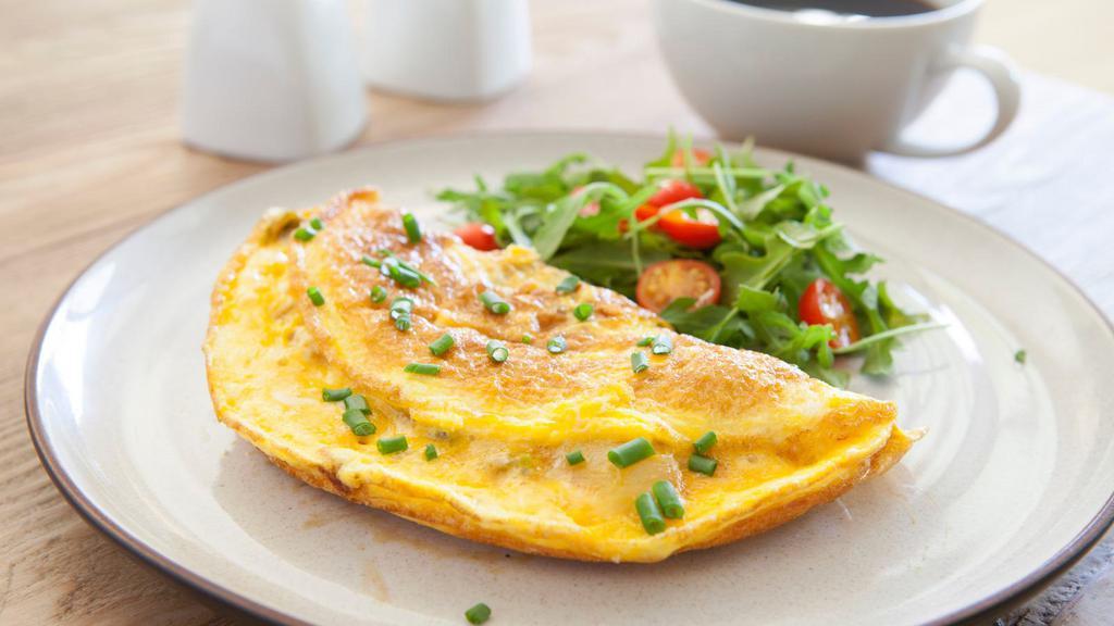 Plain Omelette · Delicious Breakfast Omelette prepared using 3 eggs. Served with a side of hash browns and customer's choice of toast with jelly.