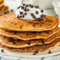 Chocolate Chip Pancakes · Served with 3 buttery pancakes cooked to perfection and topped with chocolate chips.