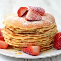 Strawberry Pancakes · Served with 3 buttery pancakes cooked to perfection and topped with fresh strawberries.