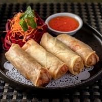 Crispy Spring Roll · Cabbage, glass noodles, carrot, sweet chili sauce. / .