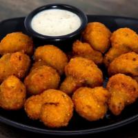 Fried Mushrooms · Deep fried miniature buttered mushrooms with ranch.
