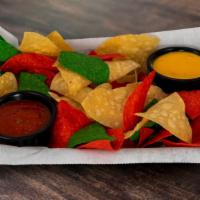 Chips, Salsa, & Queso · Made-to-order tortilla chips and mild salsa + queso for an extra charge.