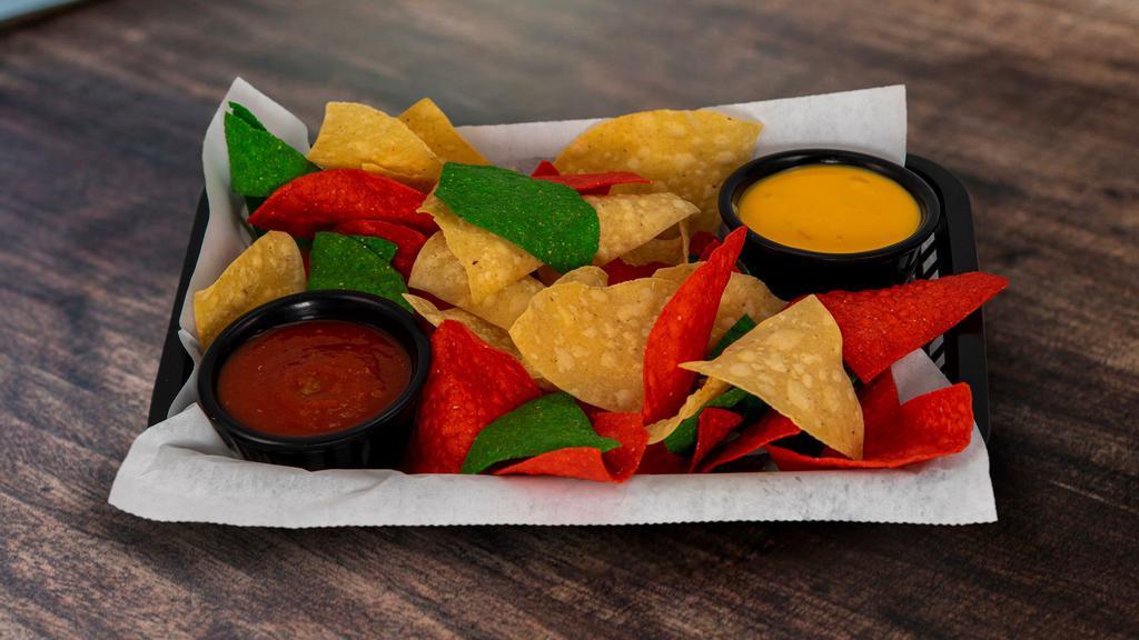 Chips, Salsa, & Queso · Made-to-order tortilla chips and mild salsa + queso for an extra charge.