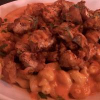 Dynamite Mac N' Cheese (Spicy) · Our famous bier cheese Mac n' Cheese topped with crispy chicken tenders tossed in Nashville ...