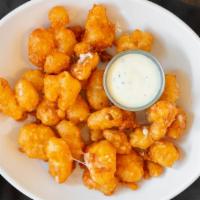 Whiskey Battered Cheese Curds · Top secret whiskey battered white cheddar cheese curds, choice of dipping sauce dipping sauc...