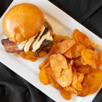 Oak Barrel Signature Burger · Smashed butter burger, cheddar, bourbon cider thick cut bacon, caramelized onions, roasted g...