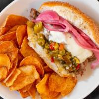 Italian Beef Sandwich · Slow roasted Italian beef, mozzarella, giardiniera relish, pickled red onion, served with si...