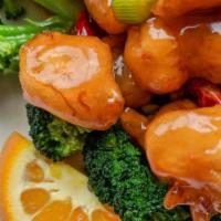 Orange Chicken · Served with fried rice steamed or lo mein and egg roll.
