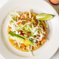 Super Taco · Corn or flour tortilla with lettuce, onions, tomatoes, sour cream, Mozzarella cheese, and av...