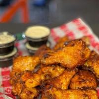 12 Joe'S Famous Wings · 12 of Joe's Famous Spicy BBQ or Hot, served with ranch or bleu cheese.