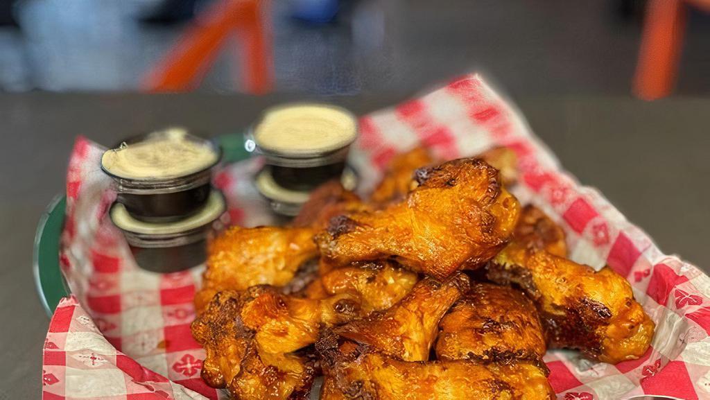 12 Joe'S Famous Wings · 12 of Joe's Famous Spicy BBQ or Hot, served with ranch or bleu cheese.