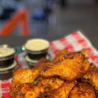 18 Joe'S Famous Wings · BBQ or Hot, served with ranch or bleu cheese. 6, 12, or 18 Wings