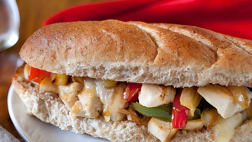 The Chicken Philly · Sautéed onions and garlic, banana peppers, baby bell peppers (none of those green), Boss sauce, provolone, romaine, and tomato served on a Cellone's hoagie bun with a side of Italian aioli and a small fry.