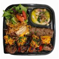 Combination Meat Plate · Beef kabob, kafta kabob, chicken kabob & chicken shawarma served with rice, salad, hummus,​ ...