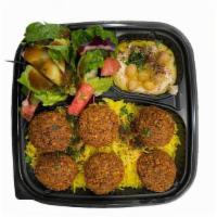 Falafel Plate · 6 pieces of Falafels, served with rice, salad, hummus and pita bread.