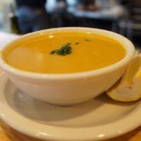 Lentil Soup · Homemade lentil soup with onions & spices, served with lemon.