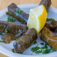 Grape Leaves · Grape leaves stuffed with rice, & olive oil.