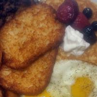 Breakfast Sampler · 2 eggs, all 2 sausage, 2 hams, 2 bacons, hash browns or grits, 2 pancake