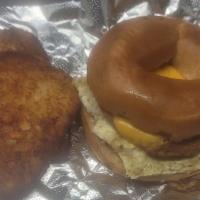 Breakfast Bagels Sandwiches Combo · choice your bagels , 2 egg, cheese and your choice of meat served with hash brown or grits