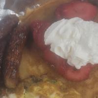 Banana Strawberry Pancakes · 2 banana pancakes, topped with strawberries and whip cream 2 eggs, 2 meats