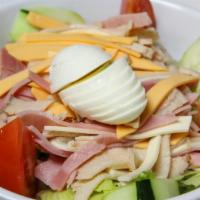 Julienne Salad · Tossed salad with turkey, ham, American cheese, swiss cheese, and hard boiled egg.