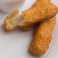 Mozzarella Sticks · Mozzarella sticks fried until golden served with homemade marinara.