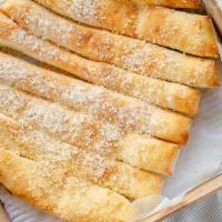 Breadstix · Eight giant breadsticks with one dipper sauce.