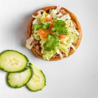 Vegetarian Sope · Served with bean, cheese, sour cream, lettuce, tomato, cilantro, and onion.